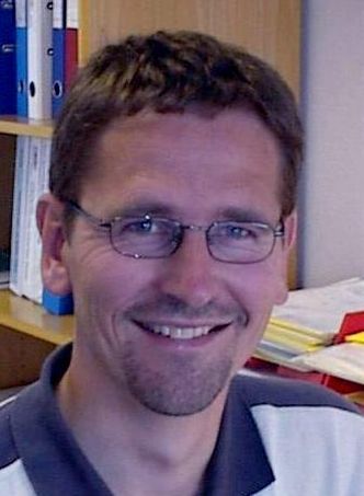 Ett av de tidlige ansatt-bildene av Roar Stormoen i KROHNEs bildearkiv. Foto:  Krohne