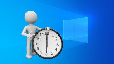 Windows 10 og figur med klokke som viser at klokken er seks.