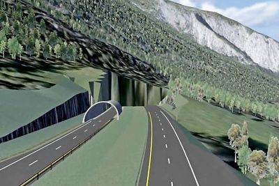 Den 3,6 km lange tunnelen gjennom Teigkampen inngår i ny E6 mellom Vinstra og Sjoa. Den får bare ett i løp i denne omgangen, derfor er det ingen portal over løpet til høyre. (Ill.: Reinertsen)