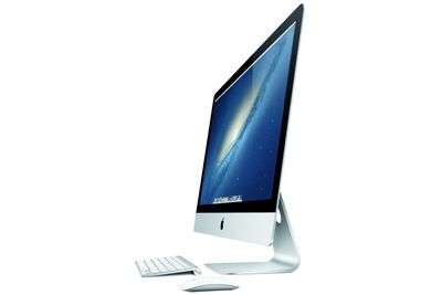 Den nye iMac-en er bare fem millimeter tykk og veier nesten fire kilo mindre enn forrige generasjon. 