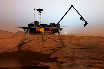 ETTER LANDING: Slik forventer NASA at Phoneix-sonden vil se ut etter å ha landet på Mars' overflate.