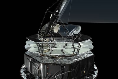 FOKUSERES: Her er det skissert hvordan Planck skal samle og fokusere mikrobølgestråling mot instrumentene ved hjelp av teleskopets to speil.