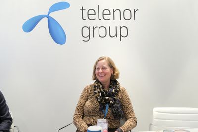 En god dag på jobben: Adm. direktør i Telenor Norge, Berit Svendsen, har mange nyheter til de norske mobilkundene fremover. Ikke minst for de som sliter med dekningen innendørs.