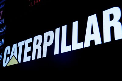 The ticker symbol and trading information for Caterpillar is displayed on a screen on the floor of the New York Stock Exchange (NYSE) in New York City, U.S., December 2, 2016.  REUTERS/Brendan McDermid