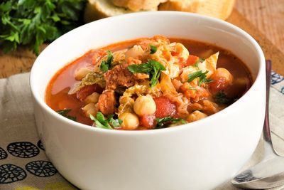 Delicious chorizo, cabbage and chickpea soup in a bowl