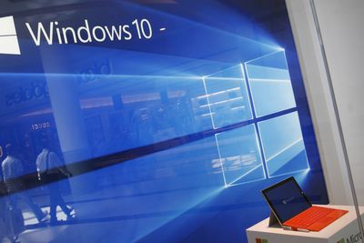 FILE PHOTO: A display for the Windows 10 operating system is seen in a store window of the Microsoft store at Roosevelt Field in Garden City, New York, U.S., July 29, 2015. REUTERS/Shannon Stapleton/File Photo