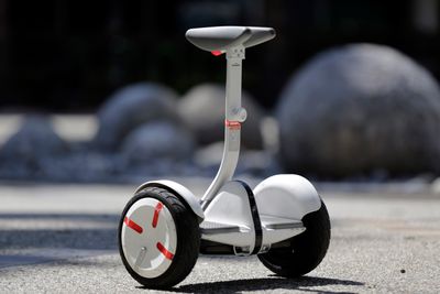 FILE - This May 27, 2016, file photo shows Segway's new self-balancing scooter, the MiniPro, in downtown Los Angeles. Despite associations with fires and falls, the MiniPro comes across as a good way to make public transit more accessible if you arenÄôt near a subway station or bus stop. (AP Photo/Reed Saxon, File)