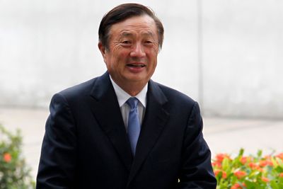 Huawei CEO and founder Ren Zhengfei walks inside Huawei's headquarters in the southern Chinese city of Shenzhen, Guangdong province, in this October 16, 2013 file photo. China's Huawei Technologies Co Ltd, the world's second-largest telecommunication equipment maker, on January 15, 2014 said revenue likely rose last year by around 8 percent, less than its target of 10 percent. Picture taken October 16, 2013. REUTERS/Bobby Yip (CHINA - Tags: BUSINESS SCIENCE TECHNOLOGY)