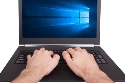 HEERENVEEN, NETHERLANDS, June 6, 2015: Laptop computer with Windows 10 background. Windows 10 is the new version of Windows OS by Microsoft Corporation; it starting July 29, 2015.