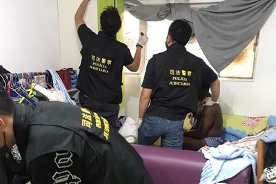 Polícia Judiciária i Macao under en ransaking i tilknytning til Operation HAECHI-II.