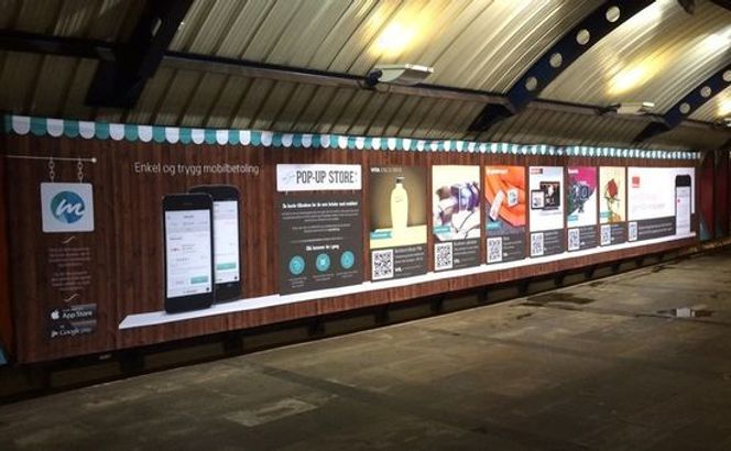 Med mCash-appen kan man bestille varer direkte fra en reklameplakat. Bilde: mCash