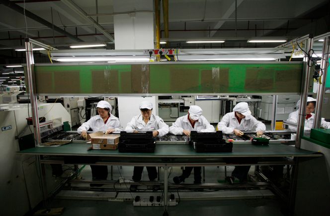 Foxconn-arbeiderne står i fare for å bli automatisert vekk. Bildet er fra Longhua i den sørlige Guangdong-provinsen i Kina. Foto: BOBBY YIP