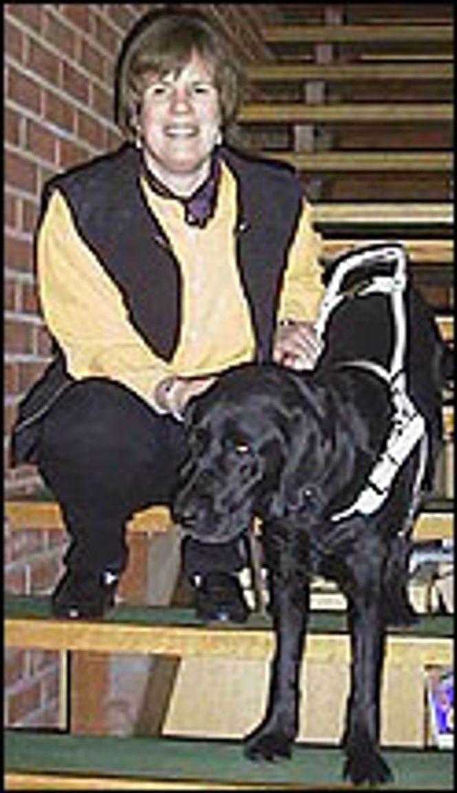 Hege Norset med førerhunden Quick. Foto: Hege Norset