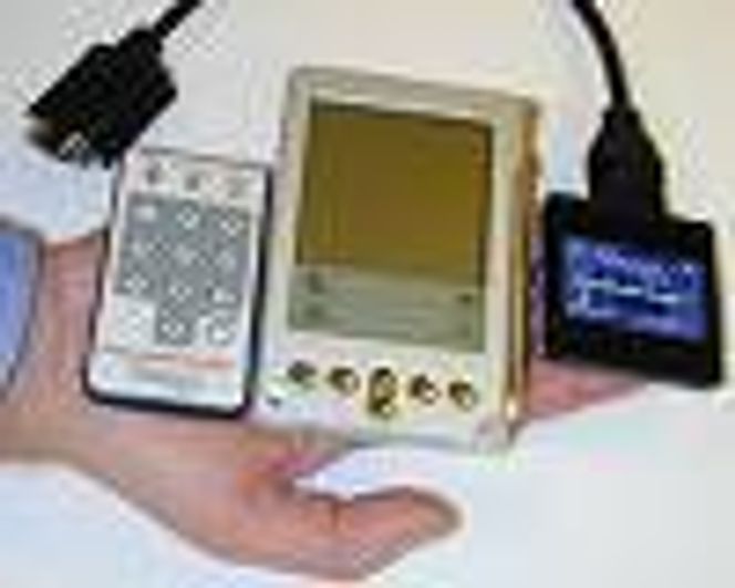 Handspring Visor hånd-PC med tilleggsutstyr Presenter-to-Go for å kjøre Powerpoint-presentasjoner.
