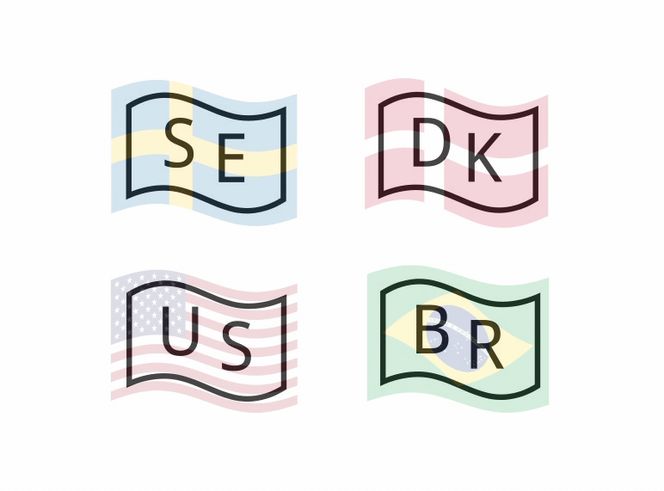 Flaggene i Googles nye emoji-font er enkle flaggomriss med landskode, her ser du den vanlige emojien i bakgrunnen Montasje: Oskar Hope-Paulsrud