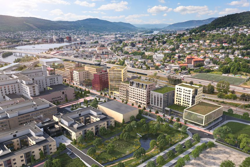 Drammen helsepark blir noen hundre meter lang -langs jernbanelinjen. Det nye sykehuset ligger foran. Foto: Drammen Helsepark