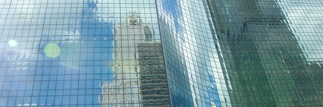 Illustrasjon av Nanoteknologi skrur varmen opp og ned i glassbygninger – helt av seg selv